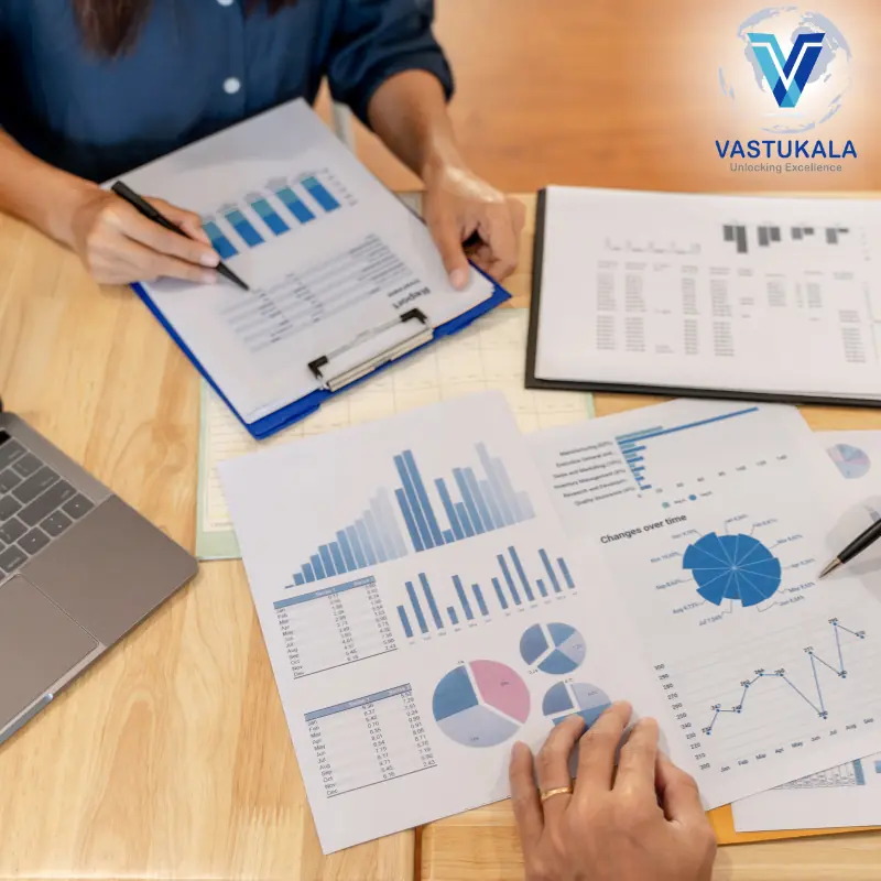 Valuation report charts and analysis on a desk