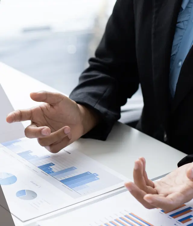 Valuer explaining charts in a report