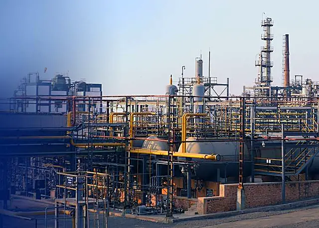 Chemical plant with columns and pipe racks
