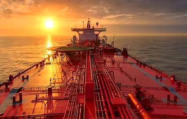 Deck of a tanker at sunset