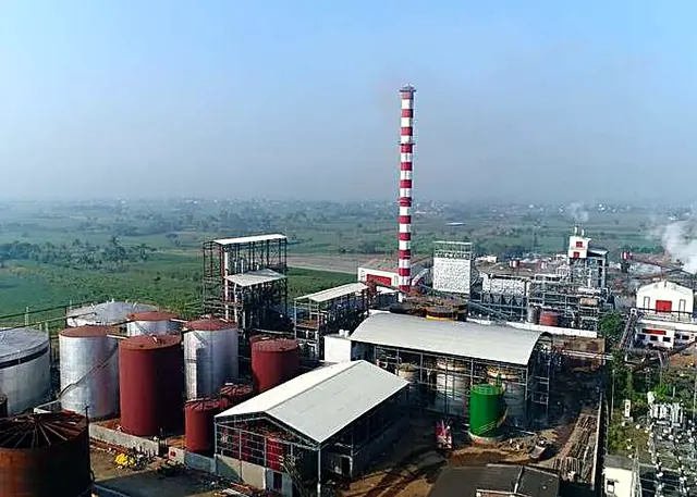 Sugar mill with storage tanks, seen from above