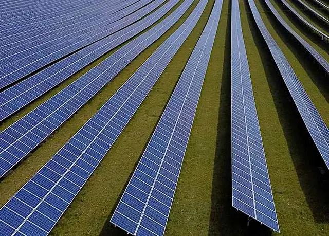 Aerial view of long rows of solar panels